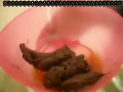 A mischievous slut was discovered urinating on a pink container.